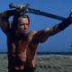 Conan The Barbarian practices with his broadsword in John Milius’ film